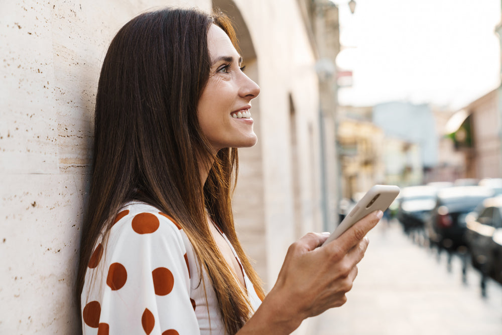 smiling_brunette_on_phone.jpg